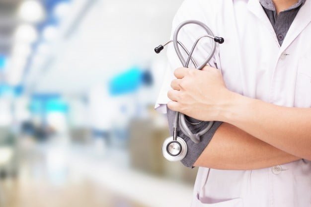 doctor with stethoscope hands hospital background 1423 1