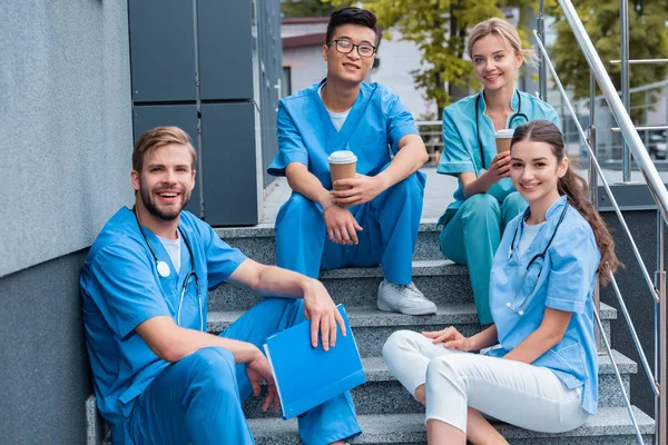 depositphotos 204519510 stock photo happy multicultural medical students sitting